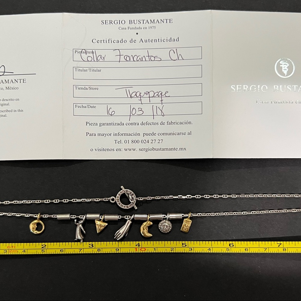 Sergio Bustamante 7 charm necklace